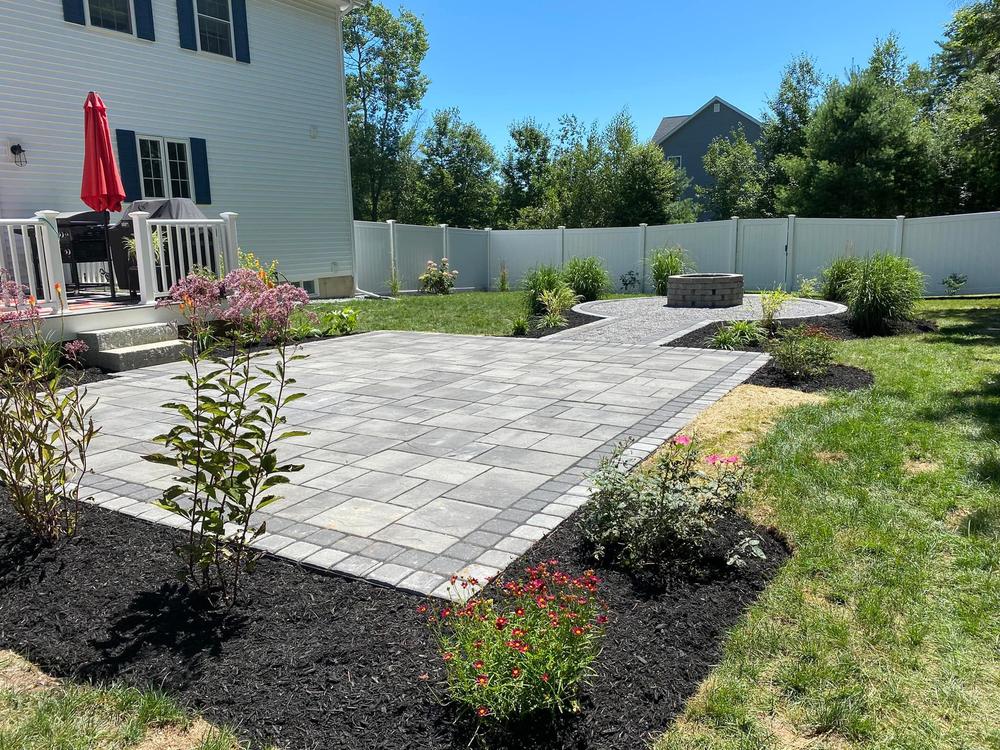 Custom paver patio installed by Kyle Poirier Landscaping LLC in Concord NH